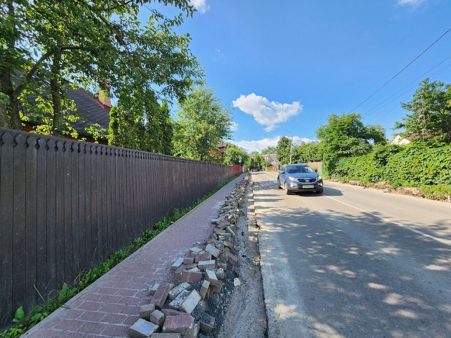 чехов, улица лопасненских ополченцев, дорожный ремонт, укладка бордюров, замена покрытия, ремонт дорог, госпрограмма московской области, развитие дорожного комплекса ,