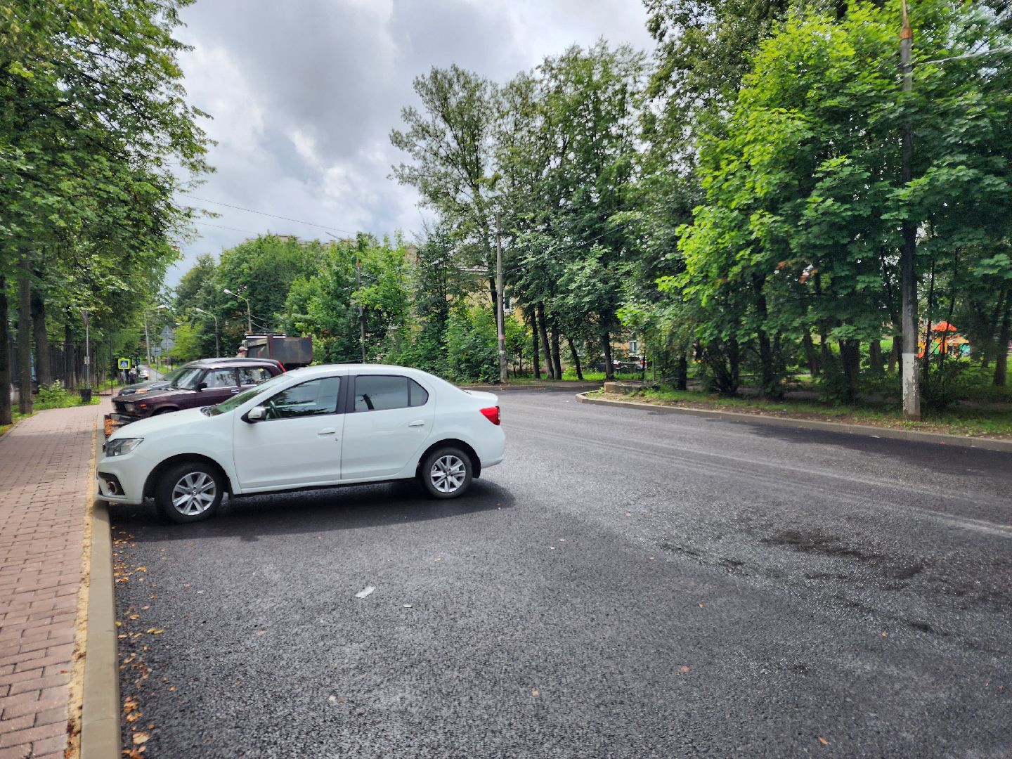 чехов, улица лопасненских ополченцев, дорожный ремонт, капремонт дороги, замена покрытия, новые бордюры, парковочные карманы, обновление проезжей части, тротуары, госпрограмма московской области, развитие дорожного комплекса, планы ремонта на 2025 год,