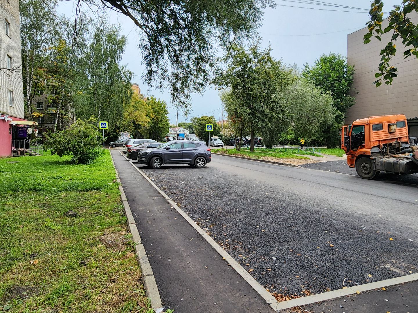 чехов, улица ильича, дорожный ремонт, капремонт дороги, замена покрытия, новые бордюры, разметка, дорожные знаки, пешеходные переходы, госпрограмма московской области, развитие дорожного комплекса, тротуары,