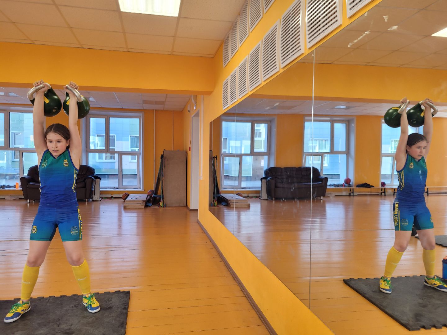 гиревой спорт; видное; успех; дети; рекорд